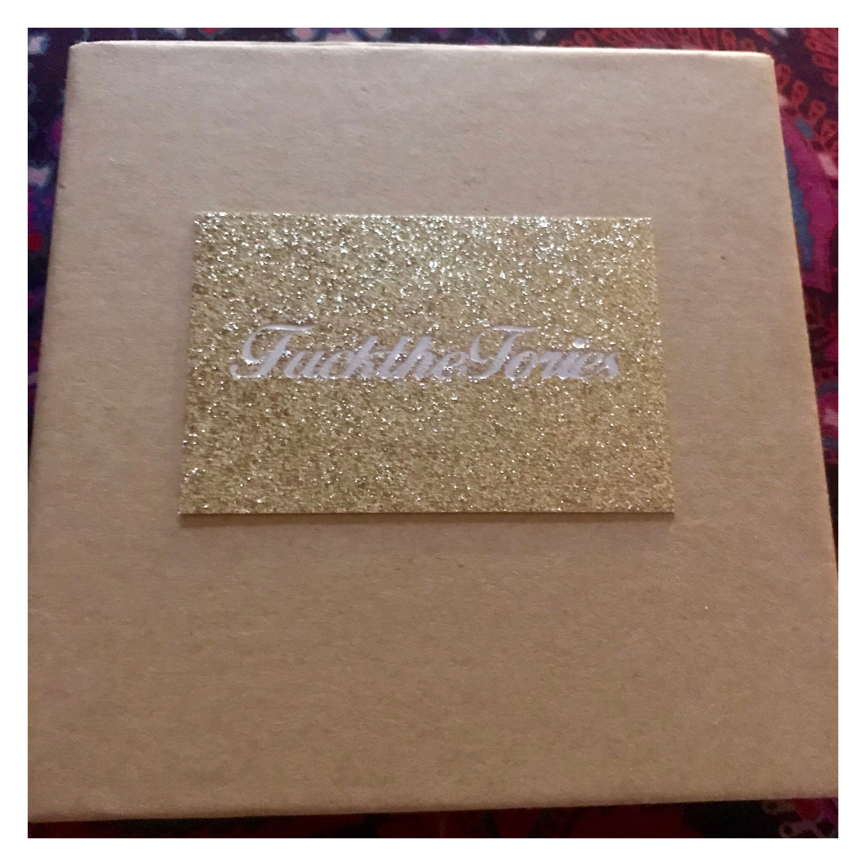 Jewellery box with glittery fuck the tories business card